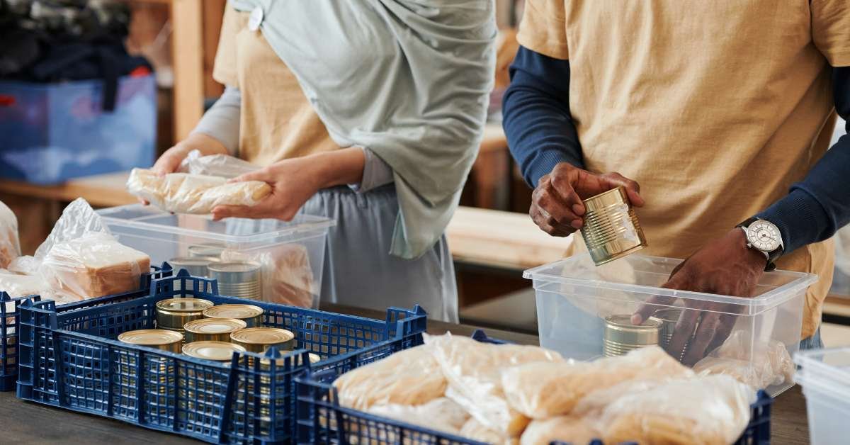 People packing food donations